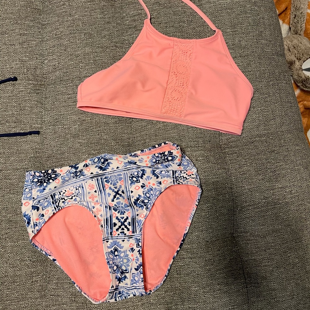 Justice size 12 bathing suit top and bottom.